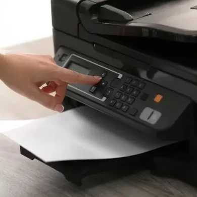bigstock-Woman-Using-Modern-Printer-In-466556807-768x512